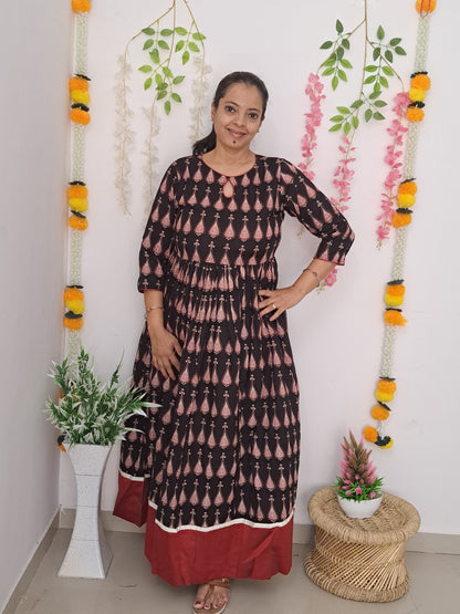 Elegance in Motion: Black and Maroon Flared Long Ethnic Dress