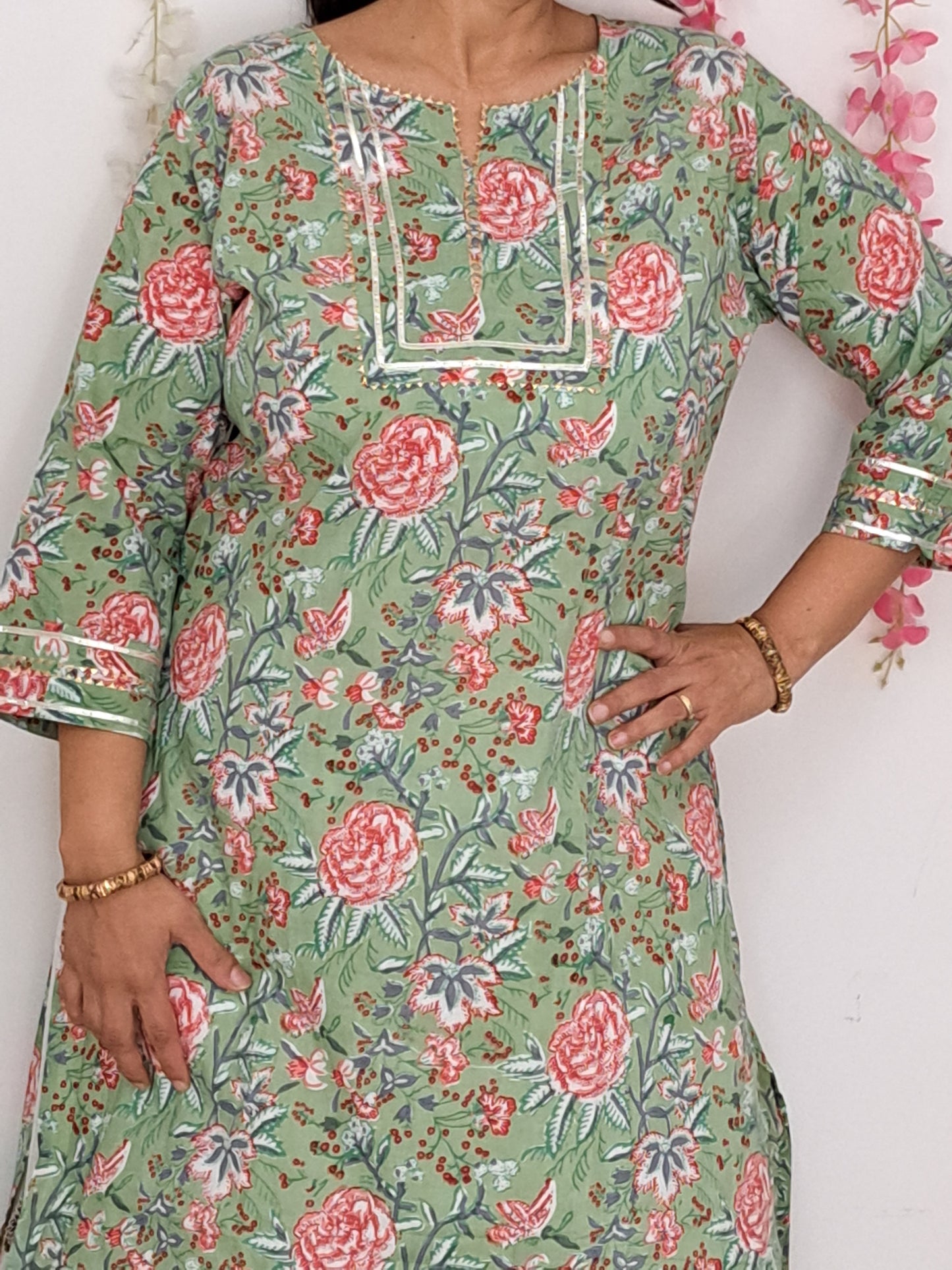 Floral Elegance: Pista Green Floral Cotton Kurta palazzo set with Gota Patti Work