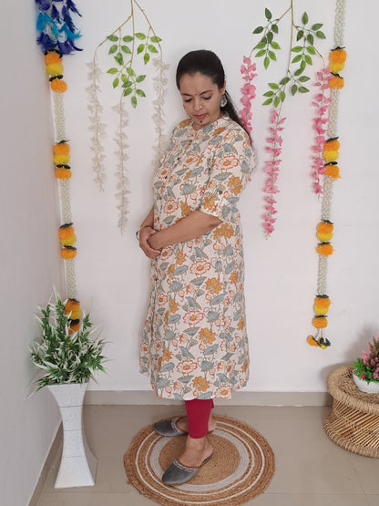 Tropical Blooms: Orange and Green Floral A-Line Cotton Flex Kurti