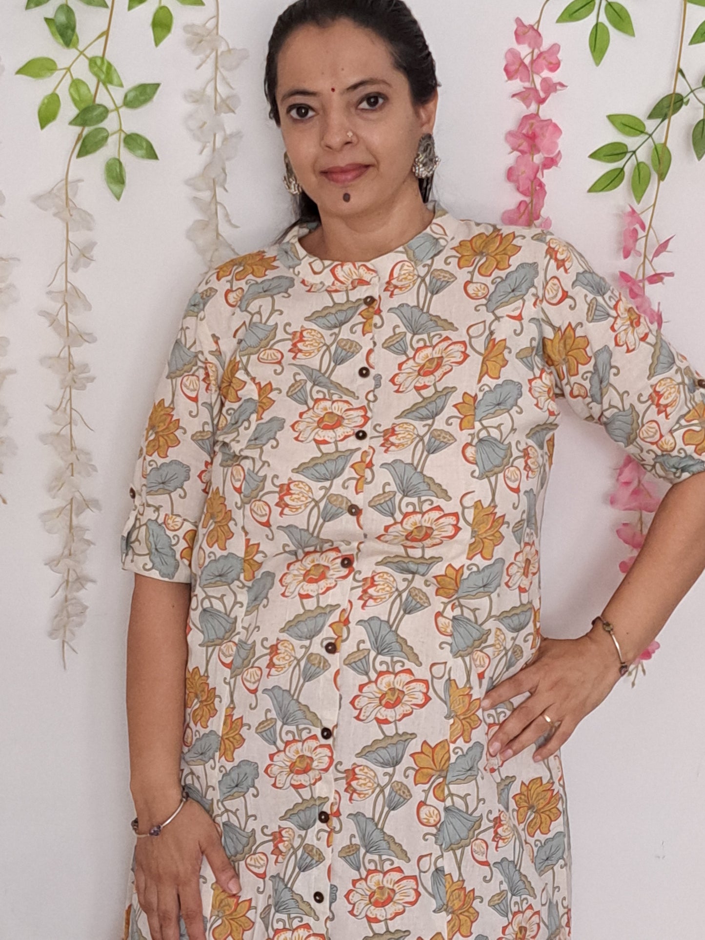 Tropical Blooms: Orange and Green Floral A-Line Cotton Flex Kurti