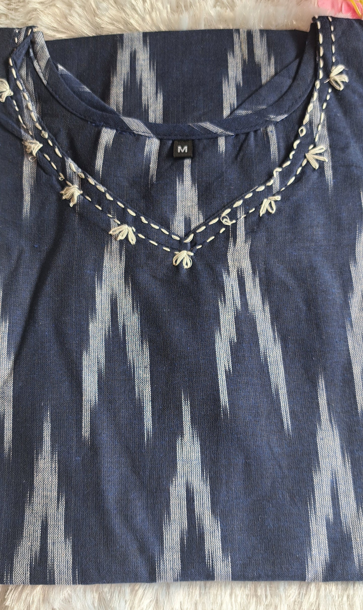 Navy blue Ikkat cotton short top with thread work on neck